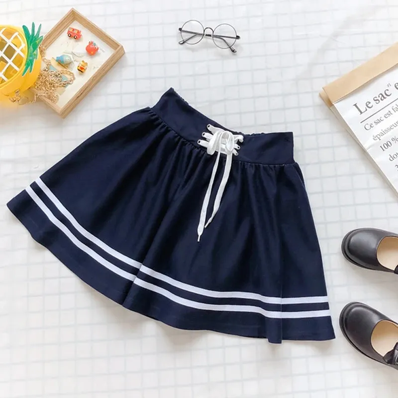 NAVY PURE COLOR STRAPPY SKIRT UB2642