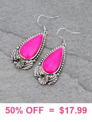 Pink teardrop stone earrings with silver setting border
