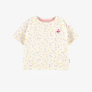 T-shirt crème en jersey à motifs de confettis, bébé || Cream T-shirt in jersey with confetti all over print, baby